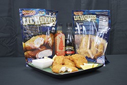 Lil’ Haddies™ are available in multiple pack sizes to fit retail, food service, and wholesale needs! This photo shows a plated portion and the retail bag design.